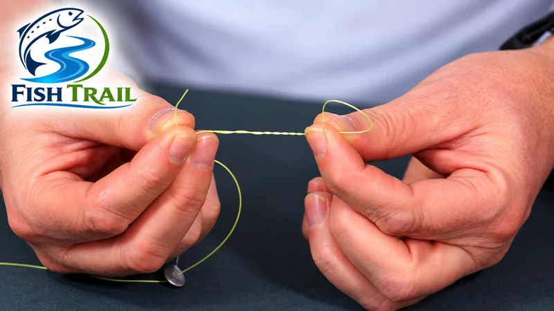 Five wraps of fishing line held between the fingers while tying a clinch knot
